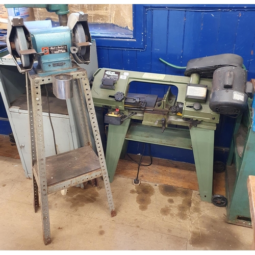 545 - A Warco 4 1/2 inch metal cutting band saw, and a Black & Decker bench grinder, on an associated stan... 