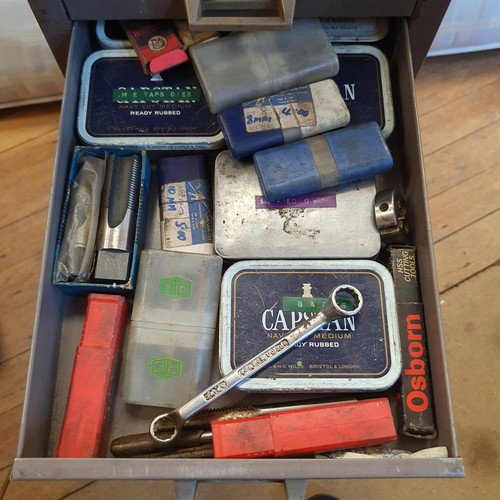 544 - Assorted tools and other items, in a painted metal filing cabinet, 29 cm wide