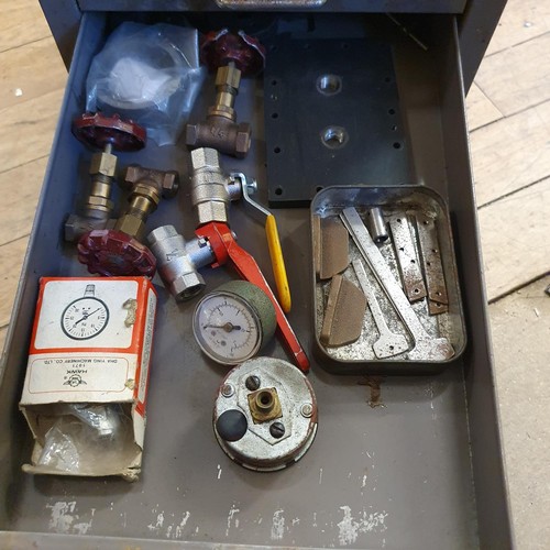 544 - Assorted tools and other items, in a painted metal filing cabinet, 29 cm wide