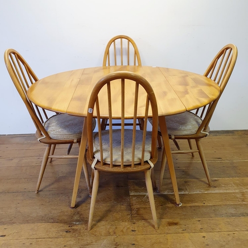 10 - An Ercol light elm drop leaf dining table, 156 cm wide, and a set of four hoop back dining chairs (5... 