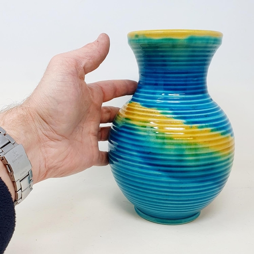 109 - A Swedish blue and yellow glazed vase, 22 cm high