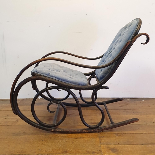 13 - An ebonised bentwood rocking chair