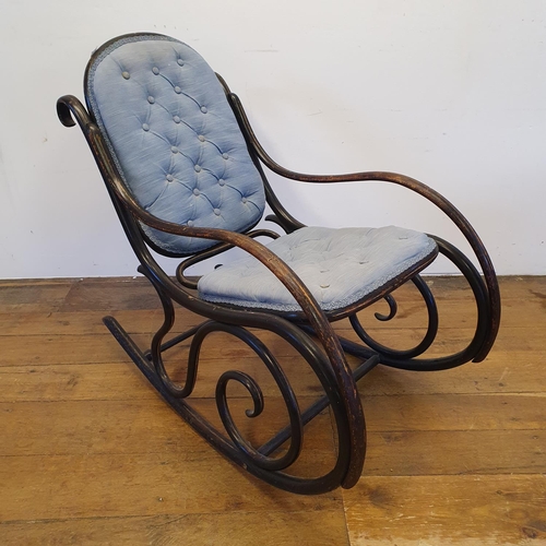 13 - An ebonised bentwood rocking chair