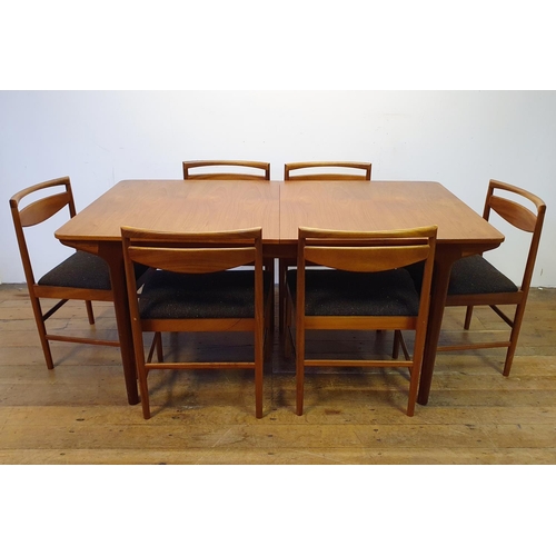 15 - A Mackintosh extending dining table, 160 cm wide, and six matching chairs (7)