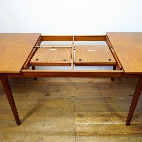 15 - A Mackintosh extending dining table, 160 cm wide, and six matching chairs (7)