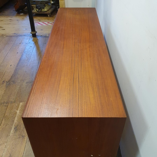 17 - A teak sideboard and a nest of tables (2)