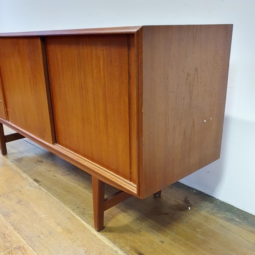 17 - A teak sideboard and a nest of tables (2)