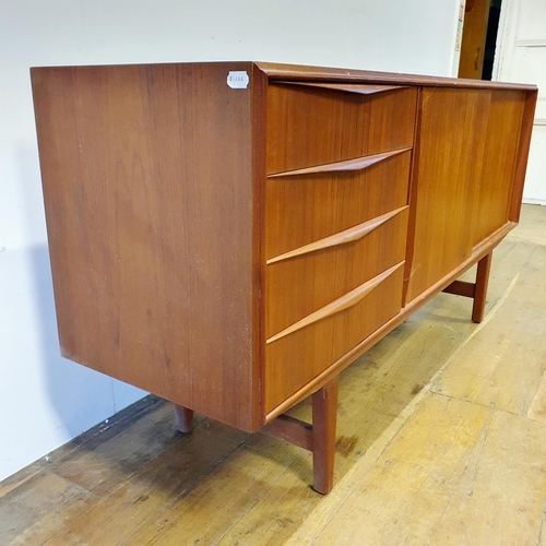 17 - A teak sideboard and a nest of tables (2)