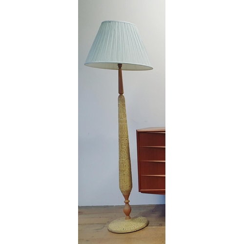 18 - A 1970's teak and pottery standard lamp