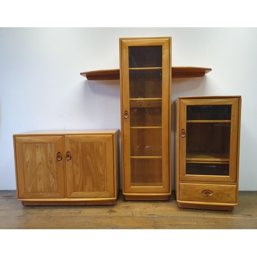 2 - An Ercol light elm cabinet, with two doors, 92 cm wide, and two Ercol units (3)