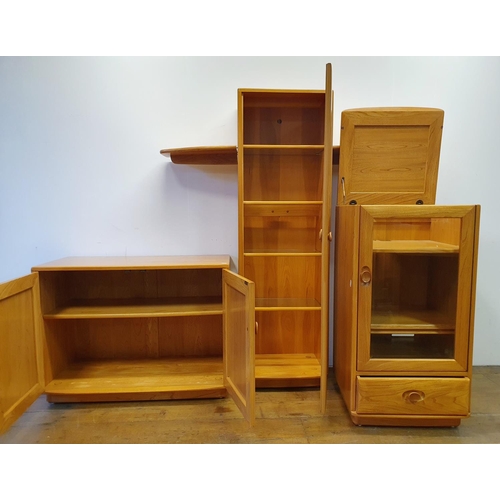 2 - An Ercol light elm cabinet, with two doors, 92 cm wide, and two Ercol units (3)