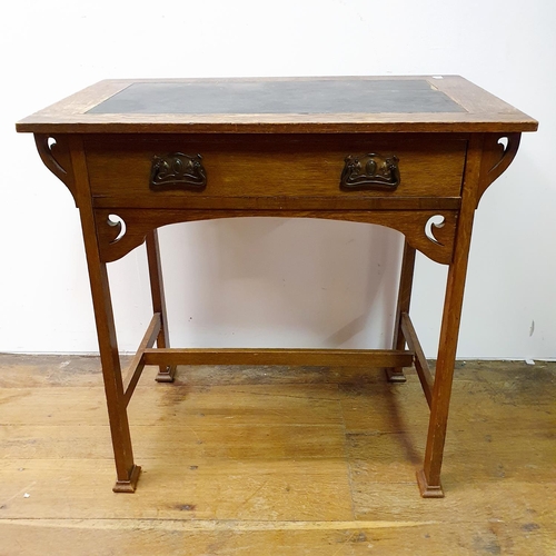 25 - An early 20th century oak side table, 75 cm wide