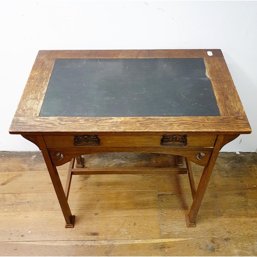 25 - An early 20th century oak side table, 75 cm wide