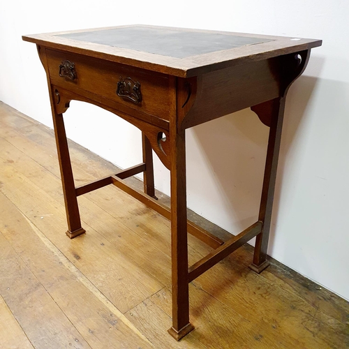 25 - An early 20th century oak side table, 75 cm wide