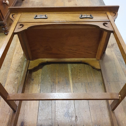 25 - An early 20th century oak side table, 75 cm wide