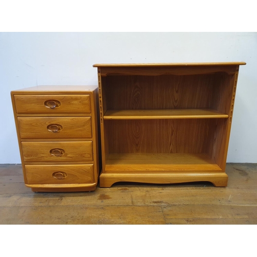 3 - An Ercol light elm bedside chest, having four drawers, 47 cm wide, and a light elm Ercol bookcase, 9... 