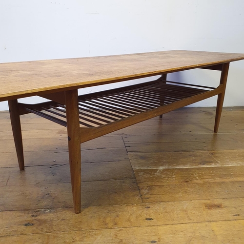 31 - A 1970s teak coffee table, 160 cm wide