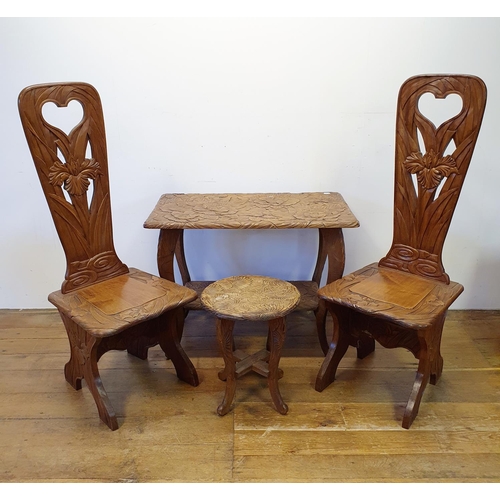 36 - A pair of Japanese carved wood high back chairs, a similar two tier table, 88 cm wide, a round table... 