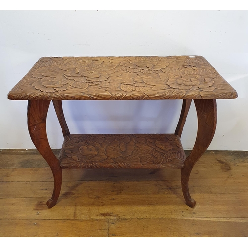 36 - A pair of Japanese carved wood high back chairs, a similar two tier table, 88 cm wide, a round table... 