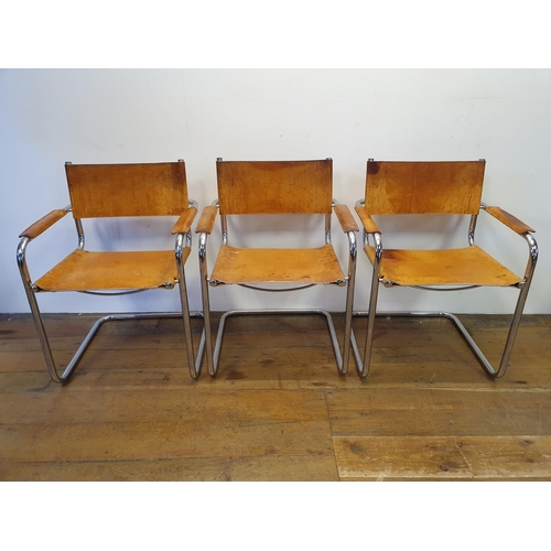 43 - A set of three leather and chrome armchairs (3)