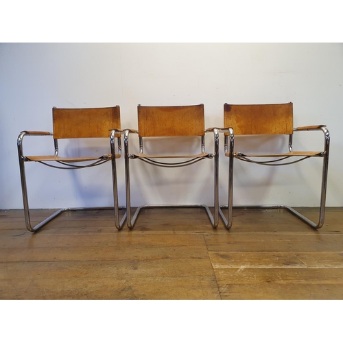 43 - A set of three leather and chrome armchairs (3)