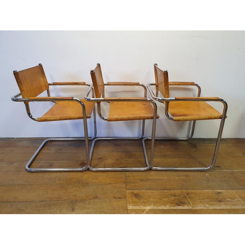 43 - A set of three leather and chrome armchairs (3)