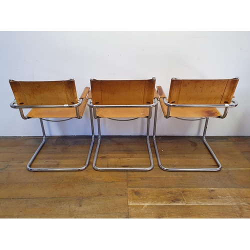 43 - A set of three leather and chrome armchairs (3)