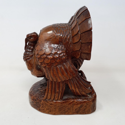 51 - A carved figure of a turkey, by Anna Edith (Nancy) Catford (1905-1992), signed in ink NANCY CATFORD ... 