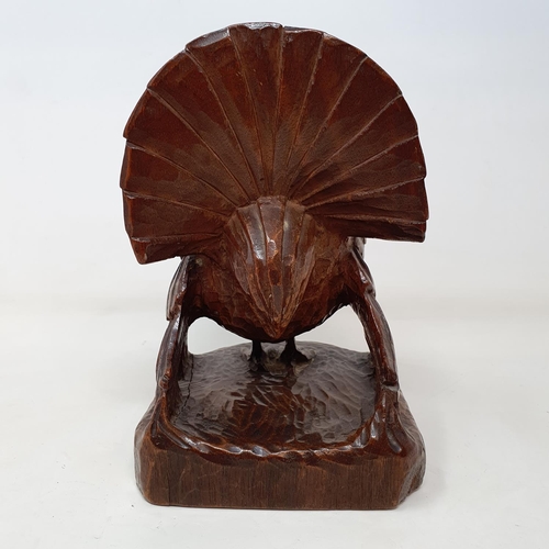 51 - A carved figure of a turkey, by Anna Edith (Nancy) Catford (1905-1992), signed in ink NANCY CATFORD ... 