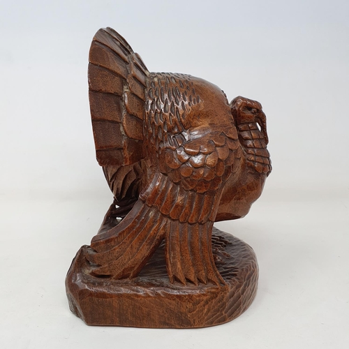 51 - A carved figure of a turkey, by Anna Edith (Nancy) Catford (1905-1992), signed in ink NANCY CATFORD ... 