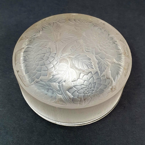 59 - A Lalique box and cover, marked R Lalique, 8.5 cm diameter