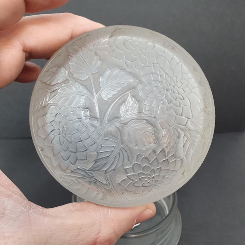 59 - A Lalique box and cover, marked R Lalique, 8.5 cm diameter