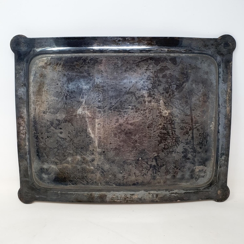 83 - An Aesthetic movement style pewter tray, 40 cm wide