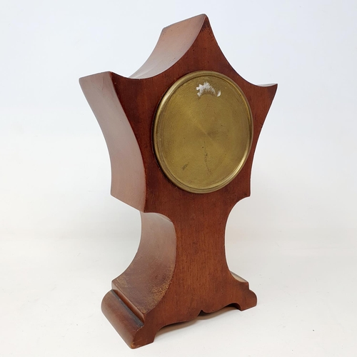 85 - An Art Nouveau style mantel clock, with an enamel dial, with Arabic numerals, with an eight day move... 