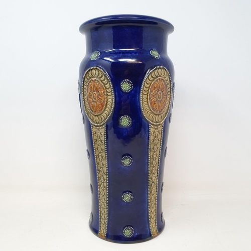 94 - A Royal Doulton vase, decorated oval panels, 32 cm high