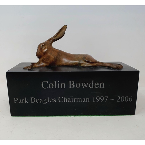 99 - A bronze figure of a rabbit, on a slate base, 22 cm wide