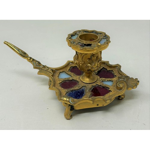 763 - A 19th century gilt metal chamberstick, set with coloured stones, 6 cm high