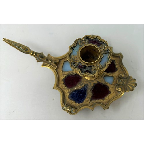 763 - A 19th century gilt metal chamberstick, set with coloured stones, 6 cm high