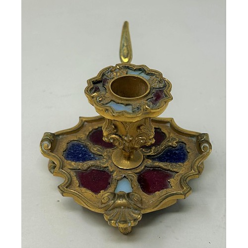 763 - A 19th century gilt metal chamberstick, set with coloured stones, 6 cm high