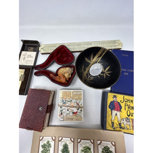 779 - A Meerschaum pipe, in the form of a lady, missing lip piece, in a leather case, and assorted other i... 