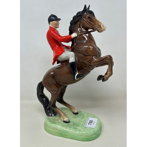 788 - A Beswick horse and rider, 24 cm high