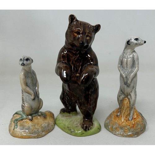 794 - A Beswick kangaroo, 15 cm high, another, two meercats, a bear, and a racoon (6)