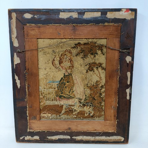 600 - A 19th century needlework panel, of a young girl with two cats, 32 x 26 cm, in a rosewood frame