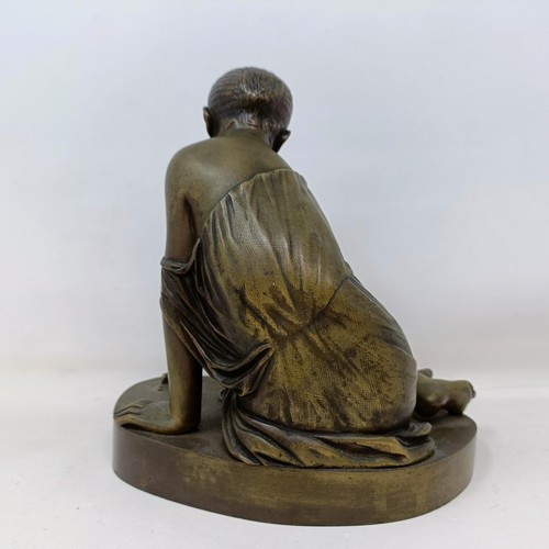 610 - A bronze figure, of a young girl, 21 cm high