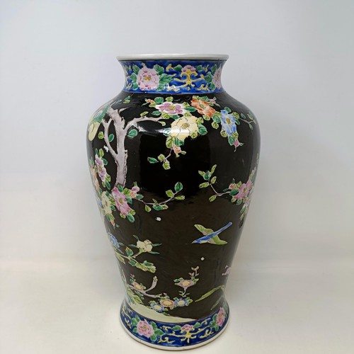 611 - A Chinese vase, decorated blossom, 38 cm high