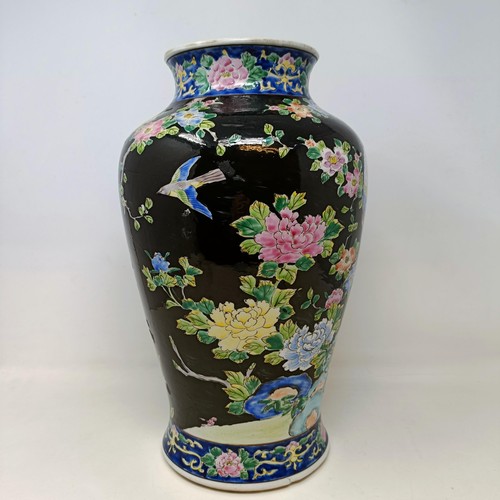 611 - A Chinese vase, decorated blossom, 38 cm high