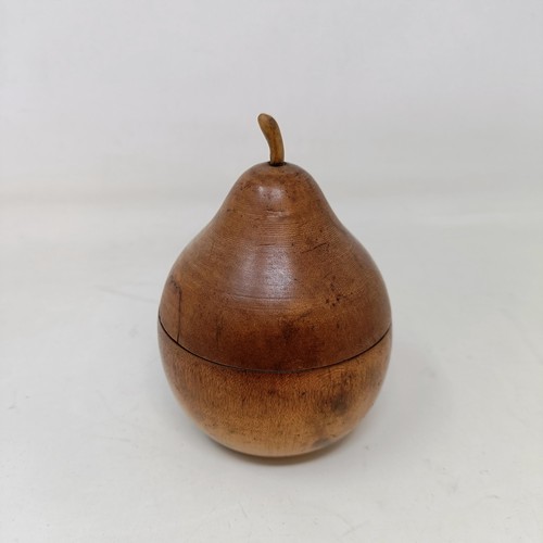 612 - A tea caddy, in the form of a pear, 10 cm high