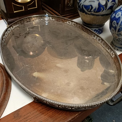 615 - A silver plated oval tray, 57 cm wide