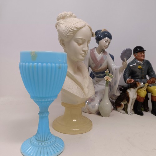 633 - A Lladro figure, of a girl looking in a mirror, lacking her small right finger, 23 cm high, a Royal ... 