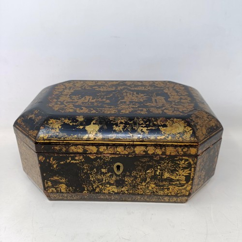 662 - A 19th century lacquered caddy, in the Chinese manner, 30 cm wide